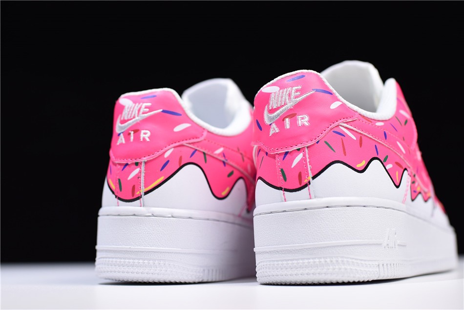 pink and white nike air force