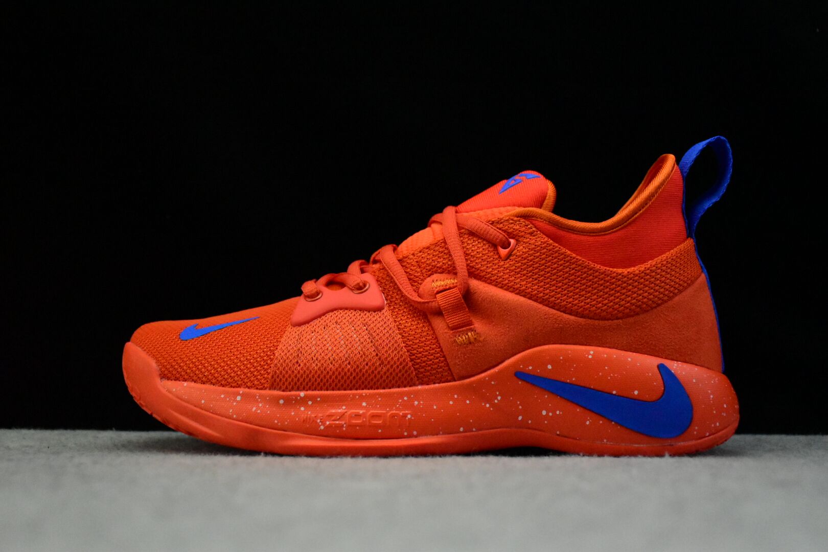 orange and blue basketball shoes